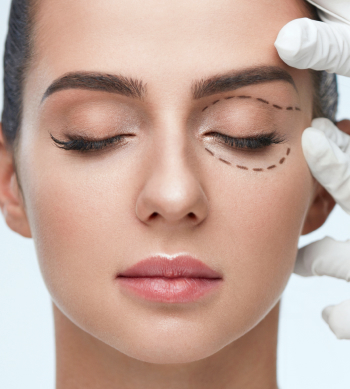 Closeup Of Beautician Hands Touching Young Female Patient