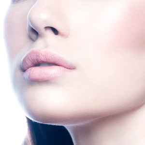 Pink female lips close-up