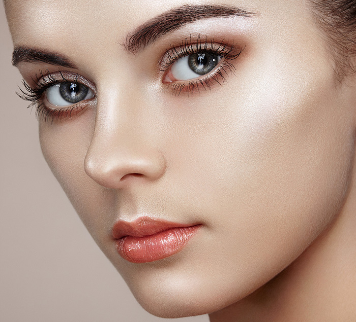 Beautiful woman face with Perfect makeup