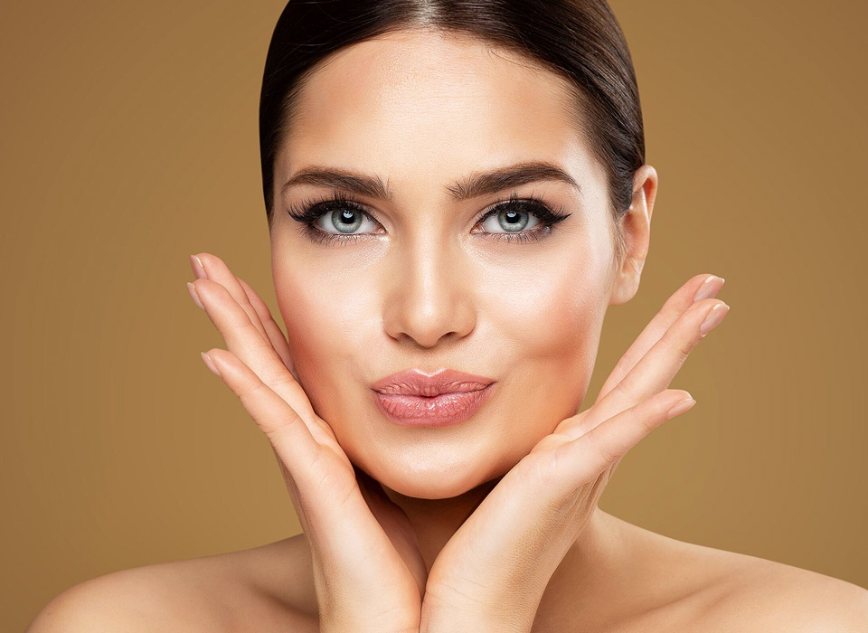 Cute Model Woman with Healthy Skin and Manicure