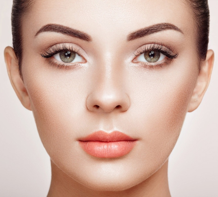 Beautiful Woman with Extreme Long False Eyelashes