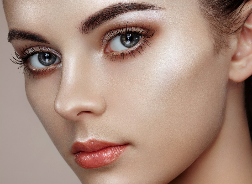 Beautiful woman face with Perfect makeup